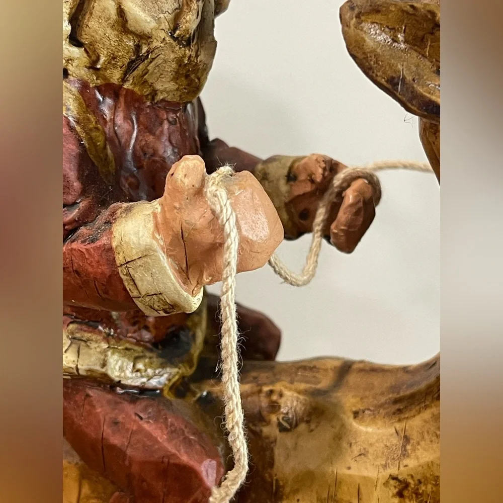 Primitive Folk Art Santa riding Reindeer 12”‎ tall chiseled resin faux wood